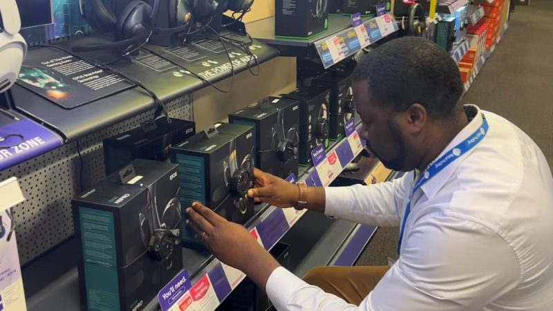 A member of the Retail Profiling field marketing team working in Currys