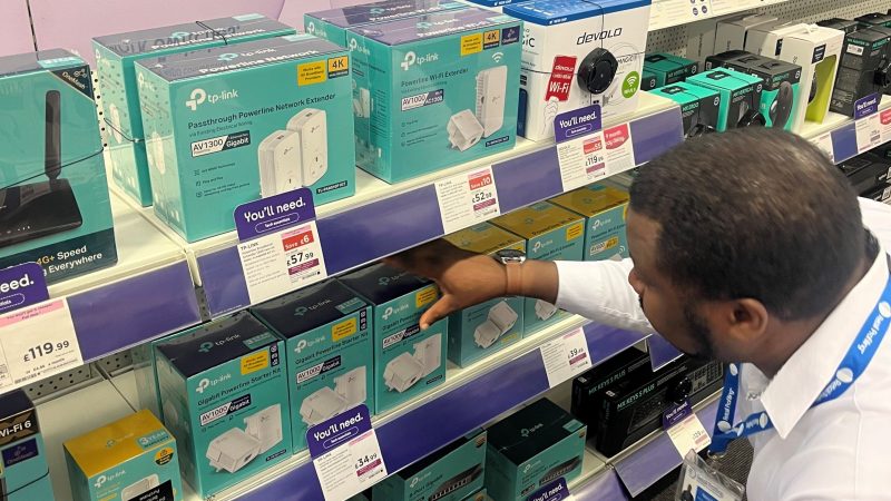 A member of the Retail Profiling field marketing team working in Currys